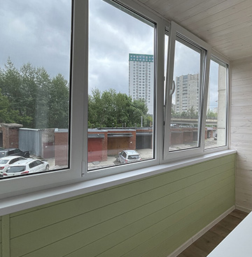 Остекление и обшивка зеленой вагонкой 