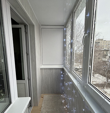 Теплое остекление лоджии с обшивкой МДФ панелями